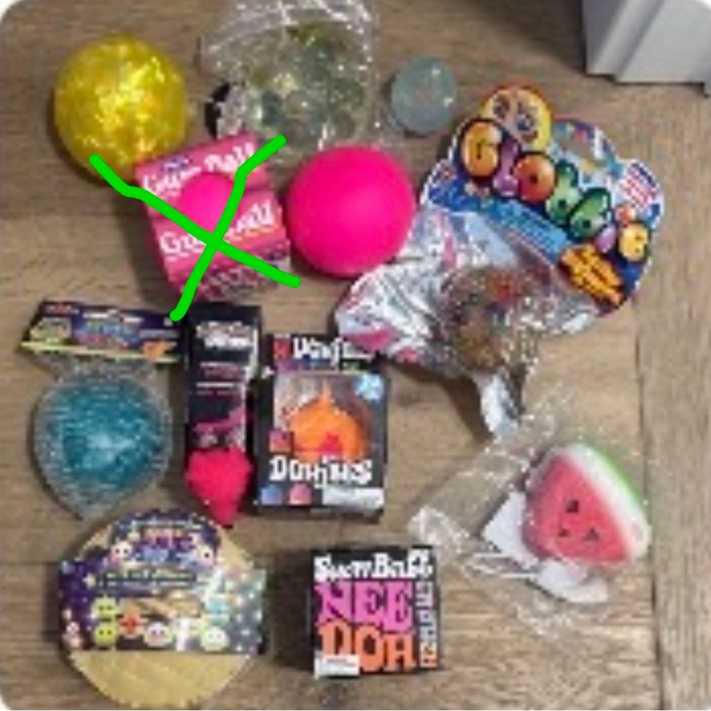 Assorted Party Favors - Pink & Yellow Stress Balls and Novelty Toys. One gumball
